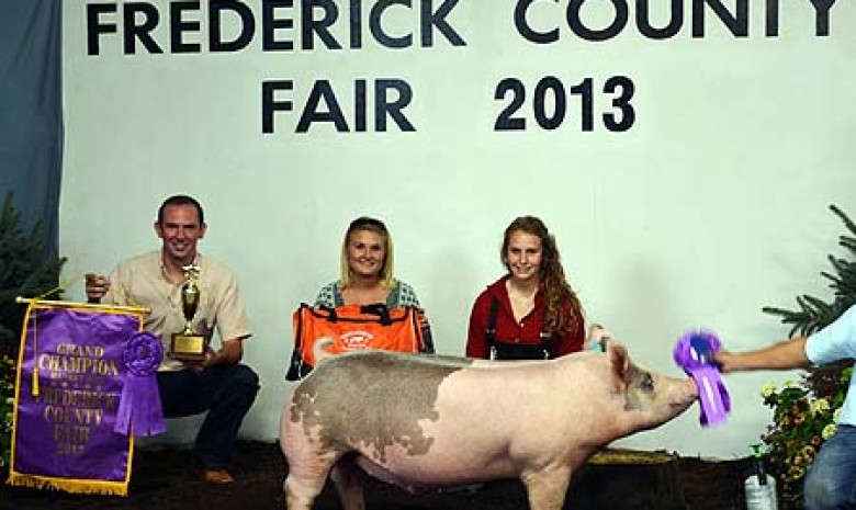 Ashten Sfarnas with the Grand Champion Market Hog at the Frederick County Fair