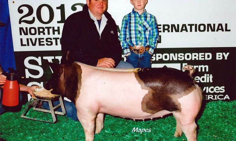 Hunter McMillen with the Ninth in Class Winner at the 2013 North American International Livestock Exposition