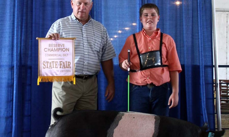 Zach McCall with the Reserve Champion Commercial Gilt at the 2013 Virginia State Fair