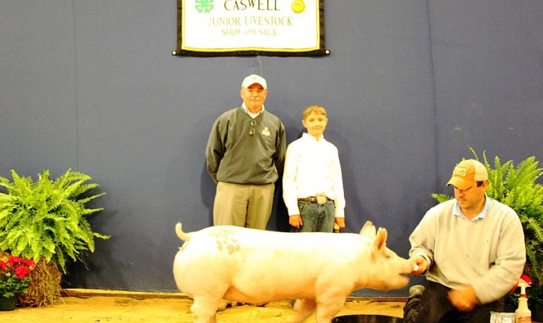 The Clark Family with the Grand Champion Market Hog at the 2014 Pittsylvania-Caswell Youth Livestock Show