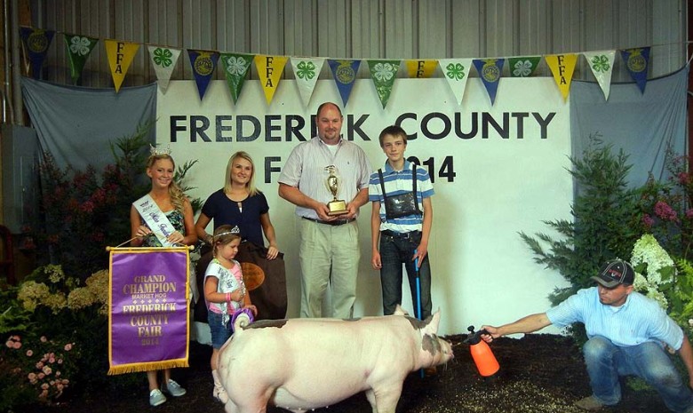 The Sfarnas Family with the Grand Champion Overall at the 2014 Frederick County, VA 4-H Livestock Show