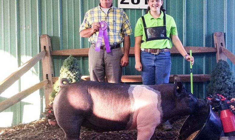 The Davis Unger Family with the Grand Champion Overall at the 2014 Clarke County, Virginia 4-H Livestock Show