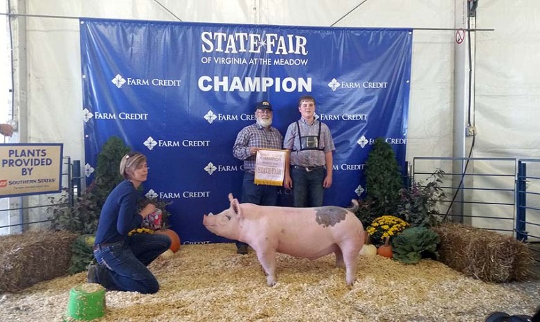 The McCall Family with the Reserve Champion Barrow Overall at the 2014 Virginia State Fair