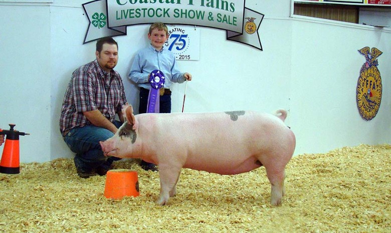 The Cox Family with the Grand Champion at the 2015 Coastal Plains Livestock Show