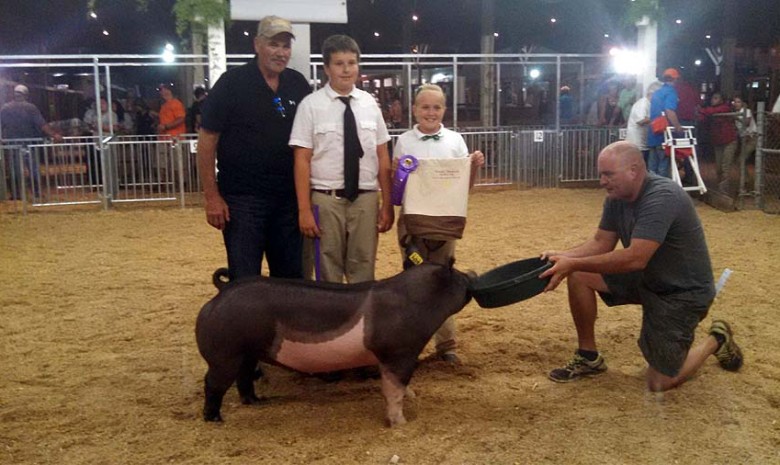 The Davis Family with the Grand Champion Division at the 2015  Montgomery County, MD 4-H Livestock Show