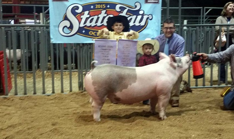 The McCoy Family with the Reserve Champion Gilt at the 2015 , NC State Fair