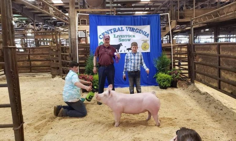 Connor Stratton with the Grand Champion at the 2019 Central Virginia Livestock Show