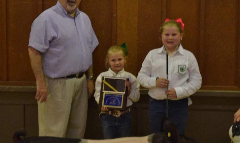 Kaylee Pittman with the Grand Champion at the 2019 Johnston County, NC Livestock Show