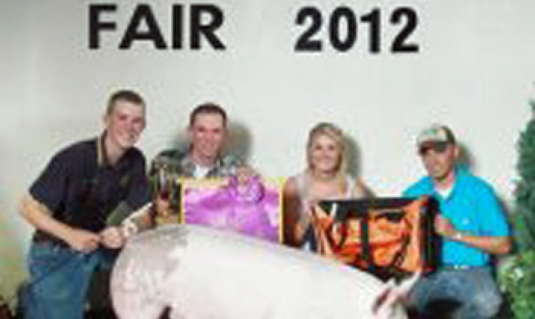 Brandon Strosnider with the 2012 Grand Champion Market Hog at the Frederick County, VA Show