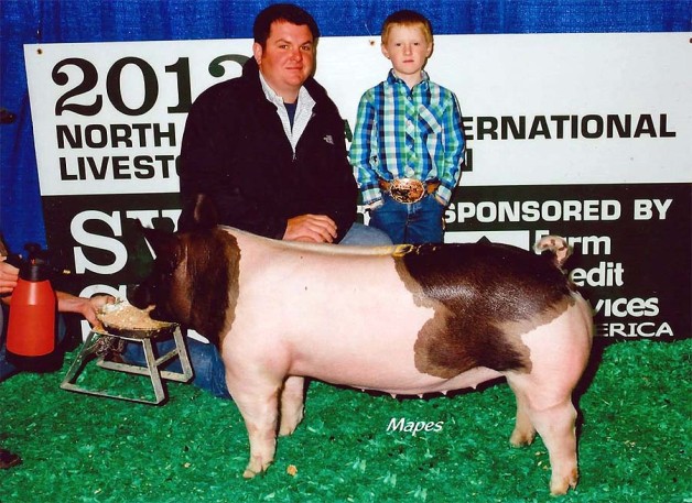 Hunter McMillen with the Ninth in Class Winner at the 2013 North American International Livestock Exposition