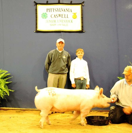 The Clark Family with the Grand Champion Market Hog at the 2014 Pittsylvania-Caswell Youth Livestock Show