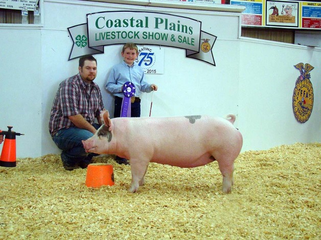The Cox Family with the Grand Champion at the 2015 Coastal Plains Livestock Show