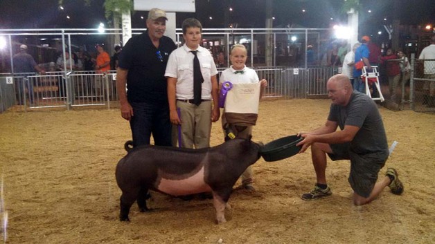 The Davis Family with the Grand Champion Division at the 2015  Montgomery County, MD 4-H Livestock Show