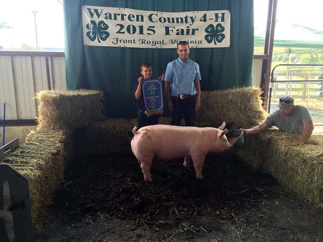The Jenkins Family with the Grand Champion Overall at the 2015 Warren County, VA 4-H Livestock Show