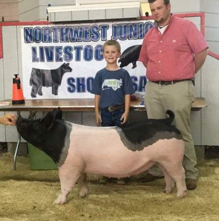 Ashton Seal with the Grand Champion at the 2017 Northwest, NC Junior Livestock Show