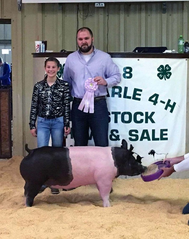 Riley Scott with the Reserve Champion at the 2018 Albemarle, NC 4-H Livestock Show