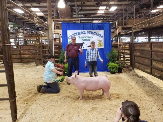 Connor Stratton with the Grand Champion at the 2019 Central Virginia Livestock Show