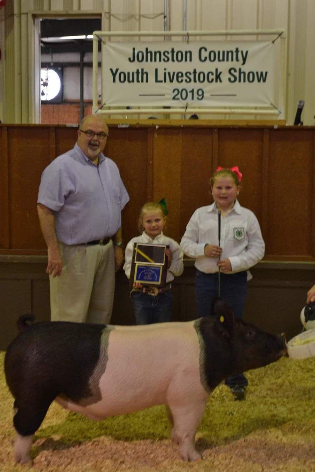 Kaylee Pittman with the Grand Champion at the 2019 Johnston County, NC Livestock Show Land of