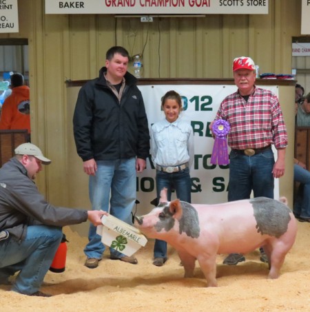 Logan Jennings with the 2012 Grand Champion Albemarle 4-H Livestock Show